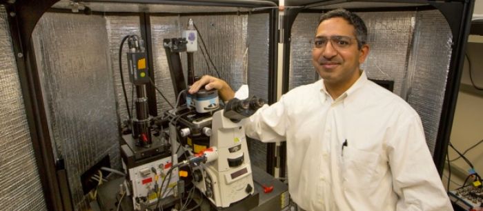 Manish Butte and colleagues in engineering have developd a way to rapidly map cells by making a major advancement in atomic force microscopy, a technology invented at Stanford. (Photo: Norbert von der Groeben)