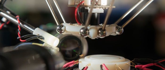 A fruit fly hangs unharmed at the end of the robot&#039;s suction tube. The robot uses machine vision to inspect and analyze the captured fly. (Photo: L.A. Cicero/Stanford News)